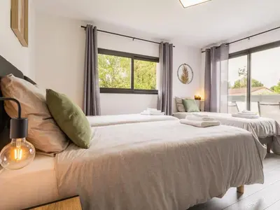 Un ou plusieurs lits dans un hébergement de l'établissement Gîte calme avec spa et terrasse, proche Nantes et Clisson - FR-1-306-1292