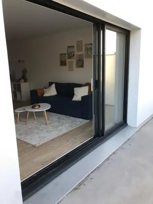Coin salon dans l'établissement Appartement cosy à 100m de la plage