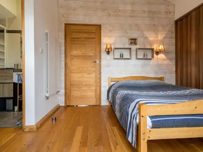 Un ou plusieurs lits dans un hébergement de l'établissement Maison éco près de la mer avec jardin et wifi - FR-1-306-1291