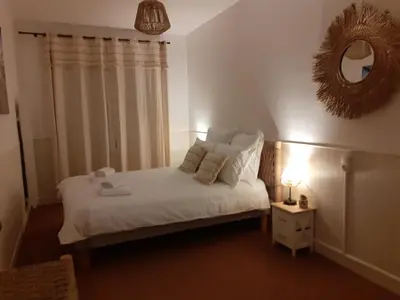 Un ou plusieurs lits dans un hébergement de l'établissement Appartement face mer Rêve de Flo ts