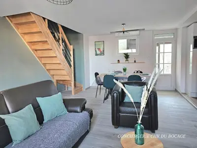 Coin salon dans l'établissement Le Relais 19 centre bourg T4 100m2 - 4min à Puy duFou