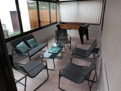 Coin salon dans l'établissement Le Relais 19 centre bourg T4 100m2 - 4min à Puy duFou