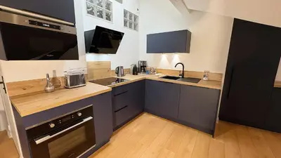 Cuisine ou kitchenette dans l'établissement Coup de Coeur Angevin - Hypercentre - Calme - Cozy