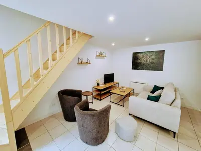 Coin salon dans l'établissement Maison de Bourg St Amand 5pers 15min Puy du Fou