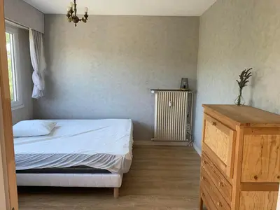 Un ou plusieurs lits dans un hébergement de l'établissement Appartement nantais 4 chambres