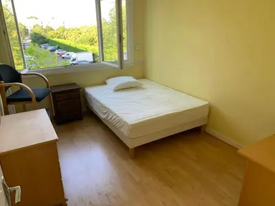 Un ou plusieurs lits dans un hébergement de l'établissement Appartement nantais 4 chambres