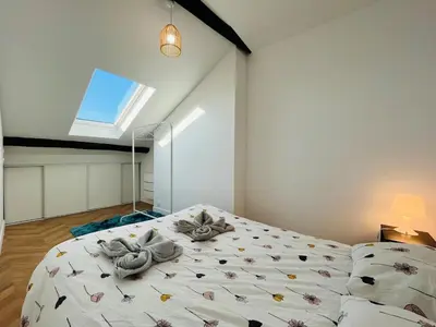 Un ou plusieurs lits dans un hébergement de l'établissement Casa Bressigny