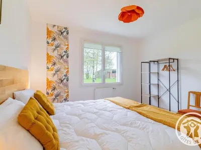 Un ou plusieurs lits dans un hébergement de l'établissement Grand gîte familial près du Puy du Fou, wifi, animaux admis, jardin - FR-1-622-96