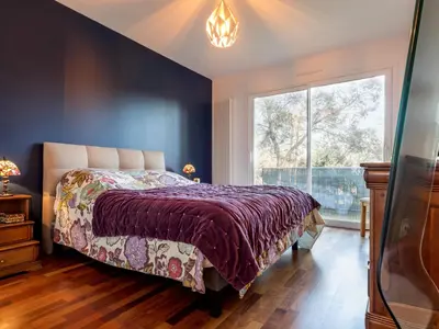 Un ou plusieurs lits dans un hébergement de l'établissement Maison spacieuse à 800m plage, jardin, animaux admis, parking, WiFi - FR-1-306-1294