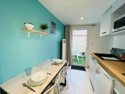 Cuisine ou kitchenette dans l'établissement Le Lys Bleu