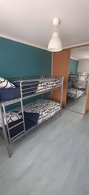 Un ou plusieurs lits dans un hébergement de l'établissement Gîte du moulin