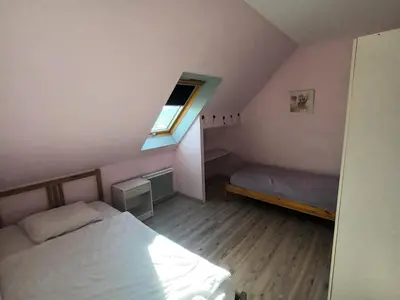 Un ou plusieurs lits dans un hébergement de l'établissement Appartement 4 couchages Le nid de l'écureuil