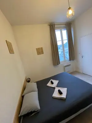 Un ou plusieurs lits dans un hébergement de l'établissement Charmant T2 - Centre - 4 personnes