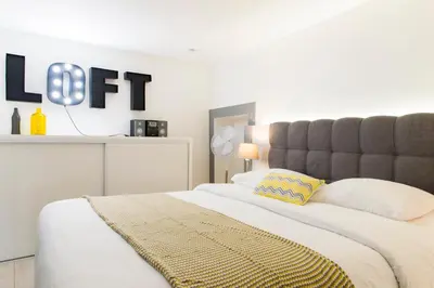 Un ou plusieurs lits dans un hébergement de l'établissement Unsejouranantes- Loft Cassard