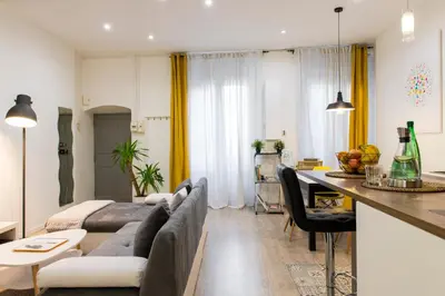 Coin salon dans l'établissement Unsejouranantes- Loft Cassard