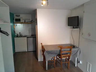 Cuisine ou kitchenette dans l'établissement Studio avec terrasse