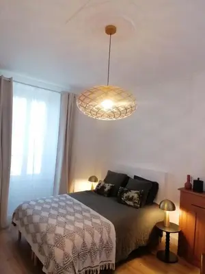 Un ou plusieurs lits dans un hébergement de l'établissement 2 chambres 4pers à 13km Du Puy dufou
