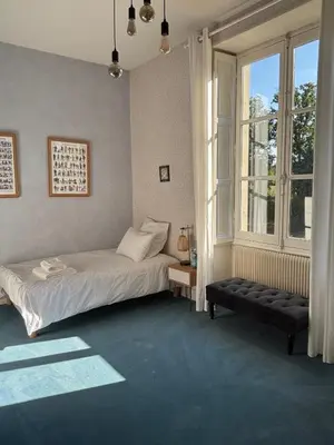 Un ou plusieurs lits dans un hébergement de l'établissement Manoir au cœur de la campagne angevine