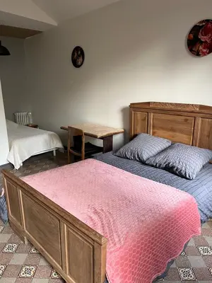 Un ou plusieurs lits dans un hébergement de l'établissement La Berge