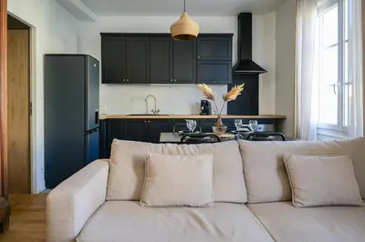Cuisine ou kitchenette dans l'établissement charmant appartement coeur de ville 4 personnes