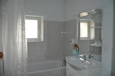 Salle de bains dans l'établissement L'Auberge du Tire Bouchon