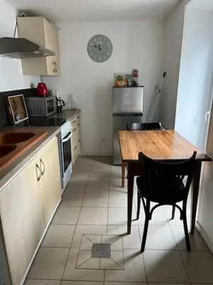 Cuisine ou kitchenette dans l'établissement La Flo