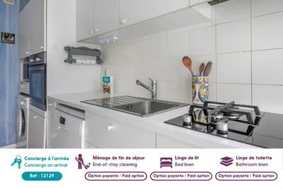 Cuisine ou kitchenette dans l'établissement Appartement dans résidence calme pour 4