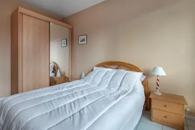 Un ou plusieurs lits dans un hébergement de l'établissement Appartement dans résidence calme pour 4