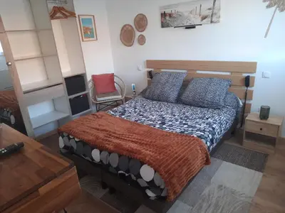 Un ou plusieurs lits dans un hébergement de l'établissement La petite maison studiot