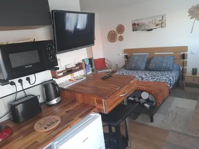 Cuisine ou kitchenette dans l'établissement La petite maison studiot