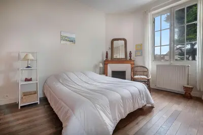 Un ou plusieurs lits dans un hébergement de l'établissement Maison pour 12 - Vue mer - Plage à La Bernerie
