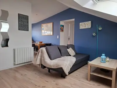 Coin salon dans l'établissement St Marc proche plage, 2 chambres
