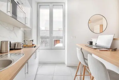 Cuisine ou kitchenette dans l'établissement Le Majorelle - Hypercentre - Quartier Apaisant