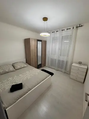 Un ou plusieurs lits dans un hébergement de l'établissement Maison des rivages 3 chambres