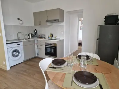 Cuisine ou kitchenette dans l'établissement Joli appartement à Paimboeuf