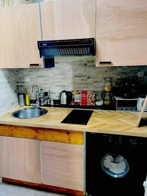 Cuisine ou kitchenette dans l'établissement Maisonnette centre au calme