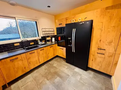 Cuisine ou kitchenette dans l'établissement Villa Napoléni - Maison - Calme - Jardin - Parking