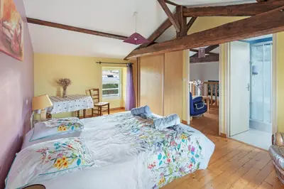 Un ou plusieurs lits dans un hébergement de l'établissement Le Gîte du Verger - Calme, paisible et jardin