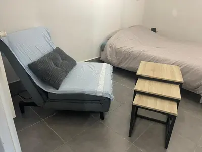 Un ou plusieurs lits dans un hébergement de l'établissement Petite Chambre avec SdB partagée