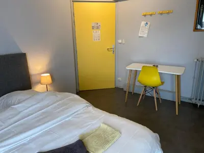 Un ou plusieurs lits dans un hébergement de l'établissement Le petit Rungis
