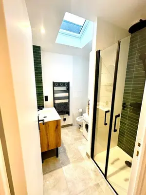 Salle de bains dans l'établissement Le Cocon - Studio Chaleureux