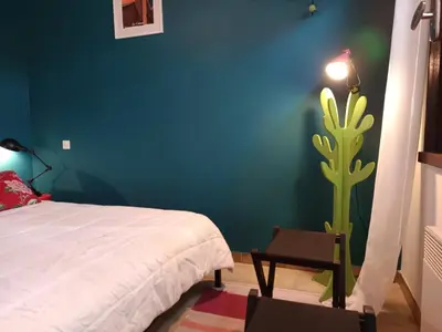 Un ou plusieurs lits dans un hébergement de l'établissement Maison rétro 62m² près de la plage - Animaux acceptés - FR-1-540-314