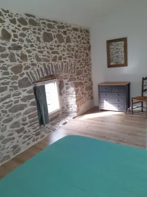 Un ou plusieurs lits dans un hébergement de l'établissement Gîte familial 8 couchages proche PuyduFou