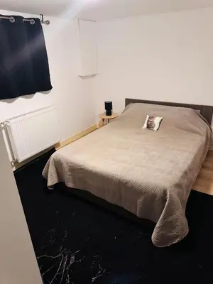 Un ou plusieurs lits dans un hébergement de l'établissement Bundel Grande Villa 6 chambres