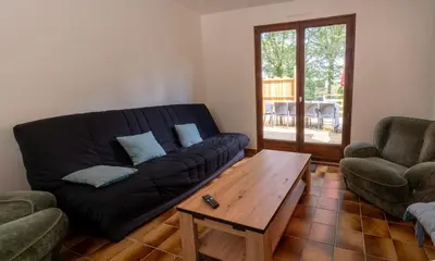 Coin salon dans l'établissement Maison au bord de l'eau, Bain nordique