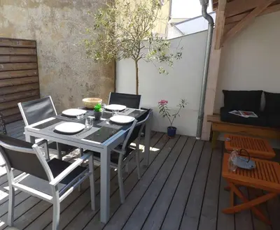 Télévision ou salle de divertissement dans l'établissement Oasis