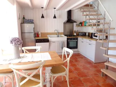 Cuisine ou kitchenette dans l'établissement Oasis