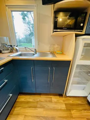 Cuisine ou kitchenette dans l'établissement Loggia Confort Clim 2ch 5per Puy du Fou