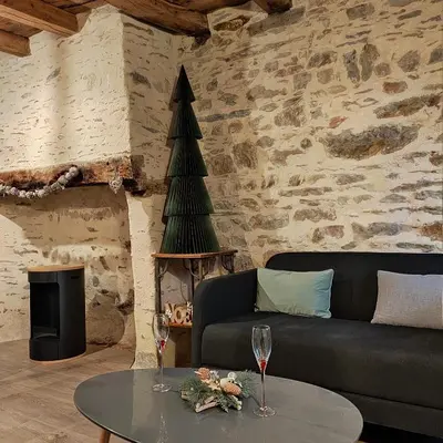 Coin salon dans l'établissement Gite de charme à Guipry Messac