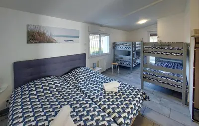 Un ou plusieurs lits dans un hébergement de l'établissement Villa Avec Piscine Privée
